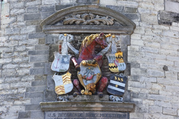 City coat of arms with unicorn on the historic Hoofdtoren defence defence tower in the harbour of Hoorn, Markermeer, part of the IJsselmeer, province of North Holland, West Friesland, Netherlands