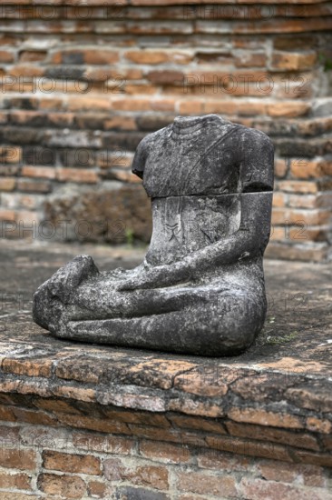 Buddha statue without head in Wat Mahathat Ayutthaya, Temple of the Great and Holy Relic, Ayutthaya, Ayutthaya Province, Thailand, Asia