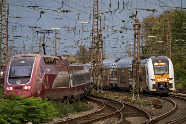 Eurostar train and RRX train leaving Essen Central Station, North Rhine-Westphalia, Germany, Europe