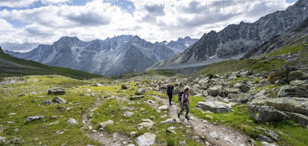 Mountaineer on a hiking trail, mountain landscape near Arolla, ascent to Col de Riedmatten, Valais, Western Alps Switzerland