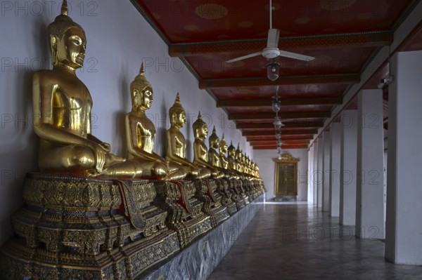 Gilded Buddha statues in Wat Pho, Temple of the Reclining Buddha, Bangkok, Thailand, Asia