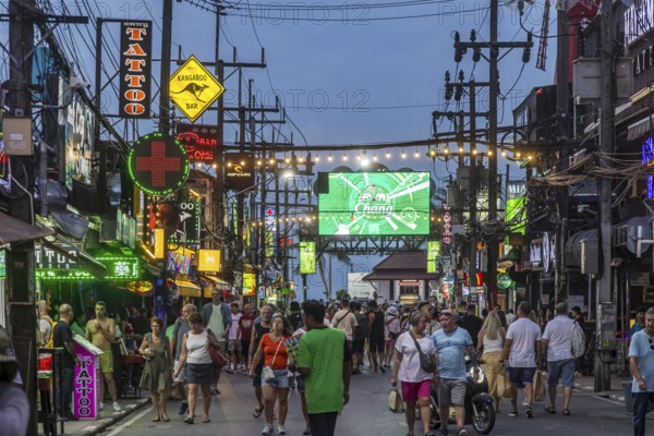 Crowds of people on Bangla Street in the evening. Nightlife on Bangla Walking Street with go-go bars, clubs, cannabis bars and extreme loudness. Patong, Kathu, Phuket Island, Thailand, Asia