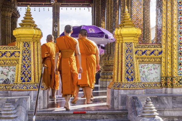 Wat Phra Kaeo temple, royal palace. Royal chapel with Buddhist monks and novices. Bangkok, Thailand, Asia