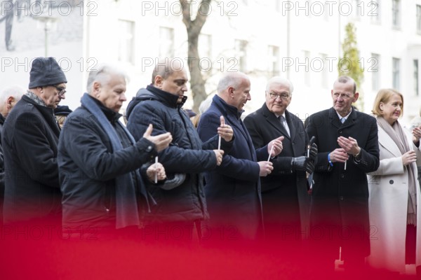 Bogdan Borusewicz (co-founder of Solidarnosc), Kai Wegner (Governing Mayor of Berlin), Frank-Walter Steinmeier (President of the Federal Republic of Germany) and Axel Klausmeier (Director of the Berlin Wall Foundation) light candles at the Berlin Wall Memorial at the central commemorative event at the Berlin Wall Memorial to mark the 35th anniversary of the fall of the Wall in Berlin, 9 November 2024