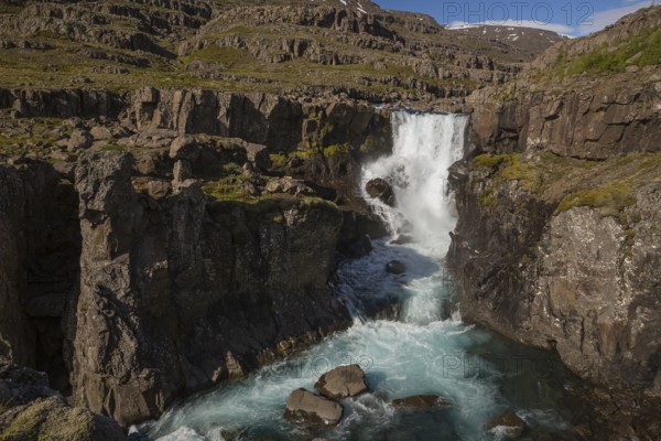 Fossardalur Waterfall close to Djupivogur at the Berufjord, Easter Iceland