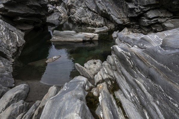 Rocks, granite rock formations in the Maggia River near Ponte Brolla, in the Maggia Valley, Valle Maggia, Canton Ticino, Switzerland, Europe