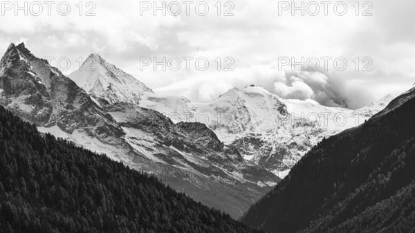Snow-covered peaks of the mountains Le Besso and Obergabelhorn, black and white photo, Val d'Anniviers, Valais Alps, Canton Valais, Switzerland, Europe