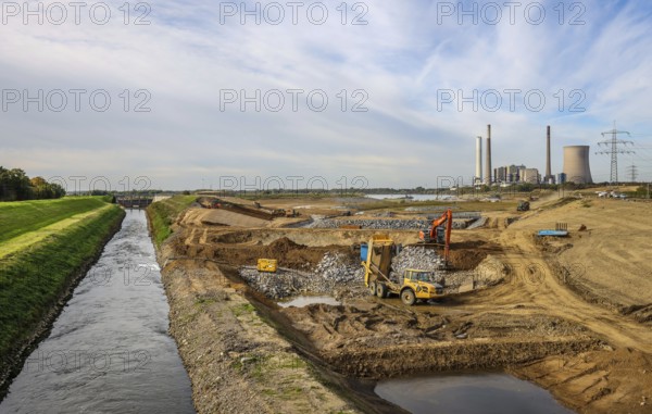Dinslaken, Voerde, North Rhine-Westphalia, Germany, Emscher estuary into the Rhine. Construction site of the new Emscher estuary in front of the decommissioned STEAG coal-fired power station in Voerde. The mouth of the Emscher into the Rhine is being moved almost 500 metres north from Dinslaken to Voerde. Fish will then be able to swim barrier-free up the new Emscher from the Rhine through a newly created floodplain area. Following the construction of a parallel sewer, the Emscher has been completely free of sewage since January 2022. The river was previously an open, above-ground combined sewer with rainwater and wastewater. The old Emscher on the left. On the right, the new Emscher main course. Flood protection through wide outlet areas in the new river delta, Europe