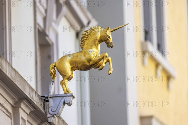 Unicorn house in Baden-Baden with sculpture of a unicorn on the façade. Baden-Baden, Baden-Württemberg, Germany, Europe