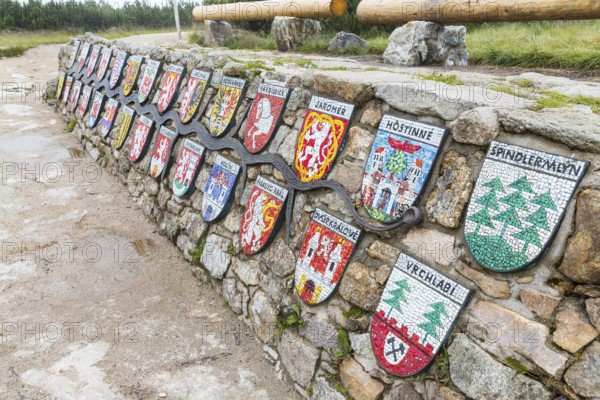 Coat of arms of all towns through which the Elbe flows at the source of the Elbe in the Giant Mountains, Czech Republic, Europe
