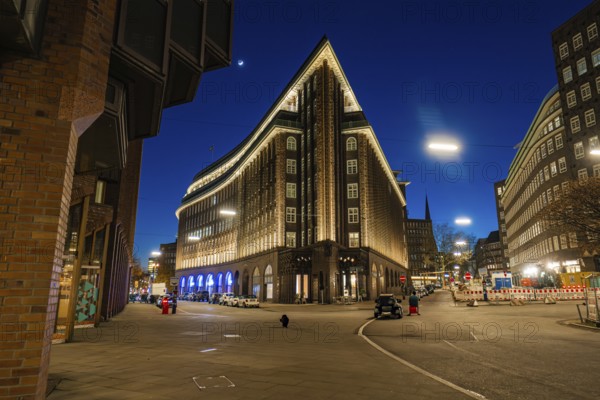 Chilehaus at night, viewed from below, brick façade illuminated, lettering visible, Hamburg, Germany, Europe