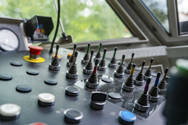 Industrial control panel with levers and various buttons, close-up, track construction Hermann Hesse railway, Calw district, Black Forest, Germany, Europe