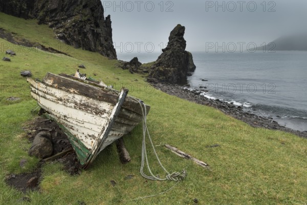Old boat, coast with fairy, Norðurfjörður, Strandir, Árnes, Westfjords, Iceland, Europe