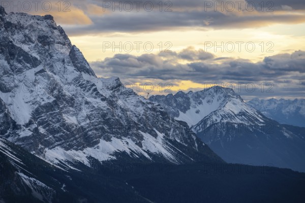 Mountain peak of the Zugspitze with snow in autumn, Wetterstein mountains at sunset, view from Kramerspitz, Bavarian Prealps, Bavaria, Germany, Europe