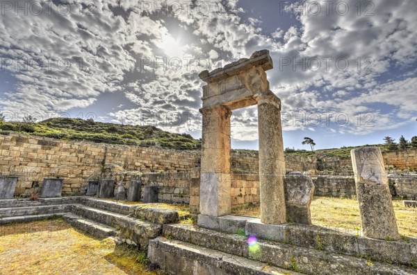 HDR, Super wide angle shot, Ancient ruins with stone walls and columns under a sunny sky with clouds, historical site, Ancient well house, Kamiros, Archaeological site, Ancient city, Foundation of Doric Greeks, Rhodes, Dodecanese, Greek Islands, Greece, Europe