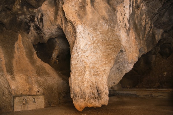 Dramatic limestone formation in a cave with strong textures, Church of Mary the Fountain of Life, Zoodochos Pigi, Rock Church, Kefalari, Argolis, Peloponnese, Greece, Europe