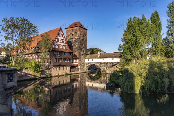 Half-timbered house Weinstadel and water tower on the Pegnitz in Nuremberg, Bavaria, Germany, Europe