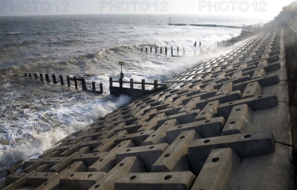 Wave swash hitting sea wall, Felixstowe, Suffolk, England, United Kingdom, Europe