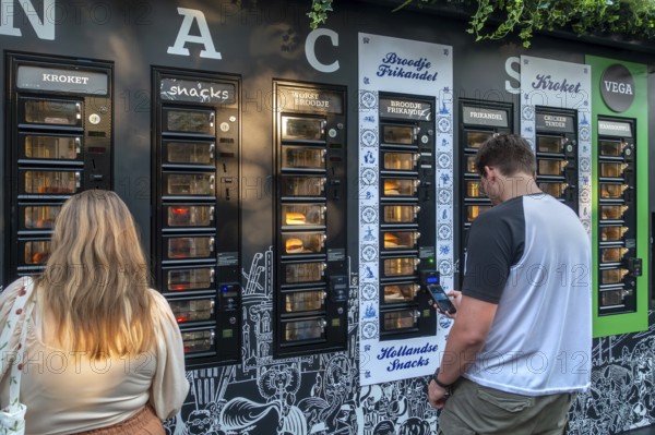 Automat, vending machine selling Dutch fried fast food during the Gentse Feesten, Ghent city festival, summer festivities in Flanders, Belgium, Europe