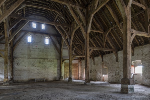 Interior showing wooden truss of 13th century Gothic monastic tithe barn of the Ter Doest Abbey at Lissewege near Bruges, West Flanders, Belgium, Europe