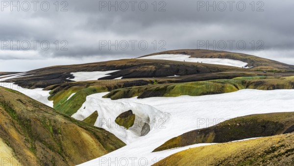 Colourful volcanic landscape with hills and snow, Laugavegur trekking trail, Landmannalaugar, Fjallabak Nature Reserve, Icelandic Highlands, Suðurland, Iceland, Europe
