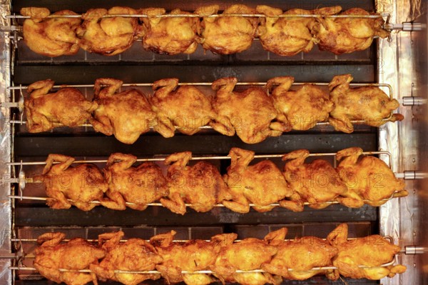 Chicken, grilled chicken, chicken on the barbecue in the beer tent, Oktoberfest, Wies'n, Wiesn, Munich, Upper Bavaria, Bavaria, Germany, Europe