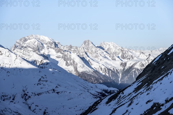 Mountain panorama with the peaks of the Bergüner Stöcke Tinzenhorn and Piz Ela, mountain landscape with snow in the morning light, view at the Keschhütte in winter, Bündner Haute Route, Albula Alps, Rhaetian Alps, Grisons, Eastern Switzerland, Switzerland, Europe