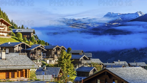Roofs covered with hoarfrost, fog rising, Grimentz, Val d'Anniviers, Valais Alps, Canton Valais, Switzerland, Europe