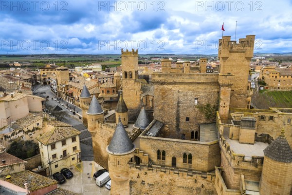 Aerial view of the medieval royal palace of olite with its impressive towers and walls, dominating the old town of olite in navarre, spain