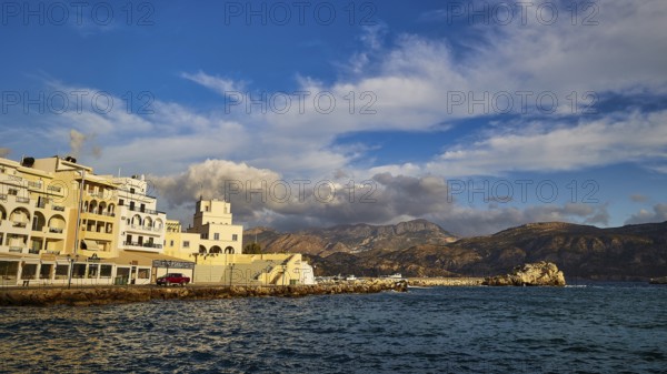 Morning light, A beautiful coastal town with harbour and mountains in the background, Pigadia, town and harbour, Pigadia Bay, main town, Karpathos, Dodecanese, Greek Islands, Greece, Europe