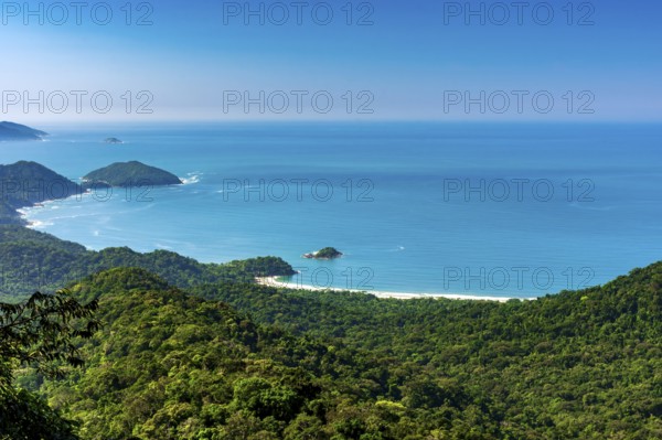 Arrival at Castelhanos beach in Ilhabela via a trail through the forest with the sea just below, Ilhabela, Sao Paulo, Brazil, South America