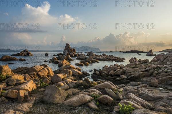 Lonely beach with granite rocks, sunrise, Spiaggia Poltu Manzu, Capo Ceraso, near Olbia, Sardinia, Italy, Europe