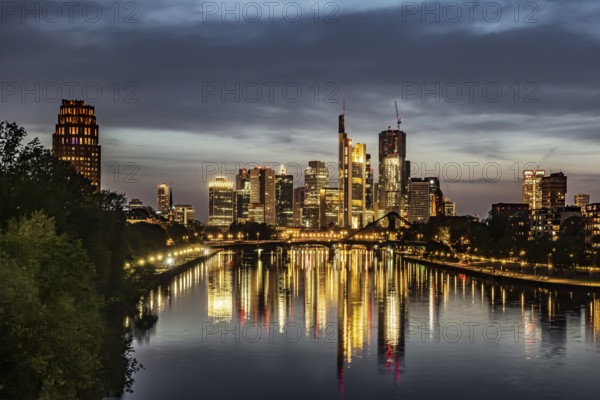Skyline of Frankfurt am Main in the evening, skyscrapers in the banking district in the evening. Frankfurt am Main, Hesse, Germany, Europe