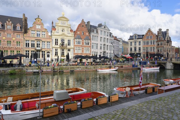 Tourist boats moored along the Graslei, Ghent, Flanders, Belgium, Europe