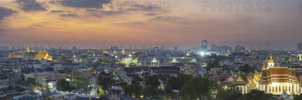 Panorama from Golden Mount to the illuminated Wat Ratchabophit, Wat Rachapradit, Wat Pho, Wat Arun, Wat Ratchanatdaram Worawihan and the skyline of Bangkok, Thailand, Asia