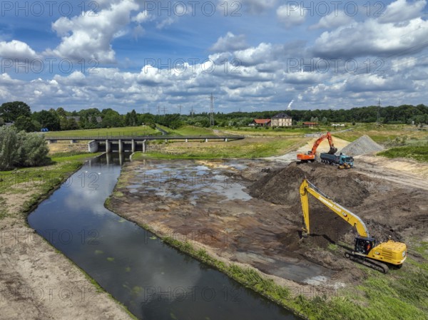 Dortmund / Castrop-Rauxel, North Rhine-Westphalia, Germany, renaturalisation of the Emscher, flood retention basin HRB Mengede. A new floodplain landscape for flood protection and biodiversity is being created at the Emscher-Auen farm. The Emscher, which is currently straightened, will be given curves again and can meander through its new floodplain. The Emscher has been completely free of sewage since 2022 following the construction of a parallel sewer. The river was previously an open, above-ground combined sewer with rainwater and wastewater, Europe