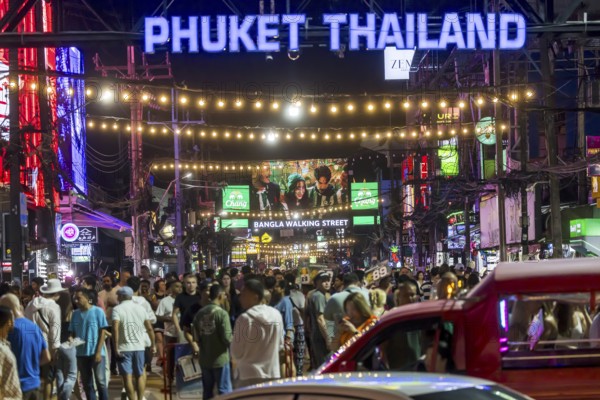 Crowds of people on Bangla Street in the evening. Nightlife on Bangla Walking Street with go-go bars, clubs, cannabis bars and extreme loudness. Patong, Kathu, Phuket Island, Thailand, Asia