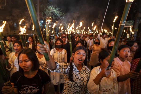 Members of the All Assam Students' Union (AASU) take part in a flaming torch rally and shout slogans to protest against the implementation of the Citizenship Amendment Act (CAA), on March 12, 2024 in Guwahati, Assam, India. The Citizenship Amendment Act (CAA), passed by the Indian Parliament in 2019, indeed grants expedited citizenship to specific religious minorities from Afghanistan, Bangladesh, and Pakistan who arrived in India on or before December 31, 2014. These religious minorities include Hindus, Sikhs, Buddhists, Jains, Parsis, and Christians, Asia