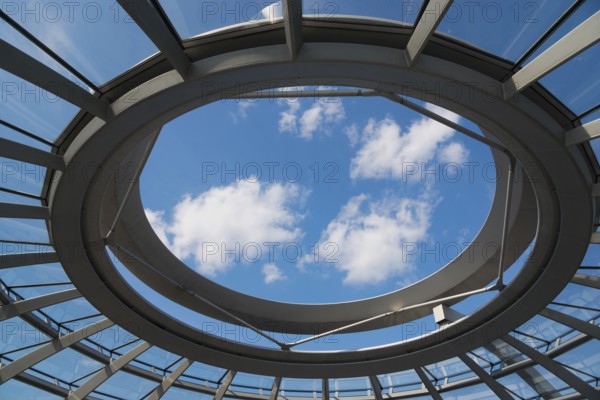 Round skylight of the dome with a view of the blue sky and clouds, Reichstag building, German Bundestag, Berlin, Germany, Europe