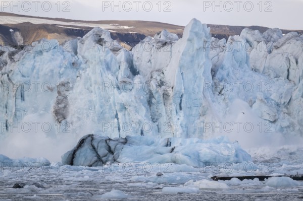 Calving glacier, calving, collapsing edge of Negribreen, Stjorfjord, Spitsbergen Island, Svalbard and Jan Mayen archipelago, Norway, Europe
