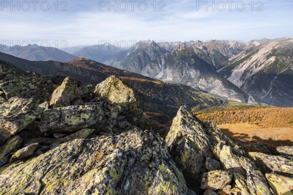 View from the ridge of the Venet to the mountain panorama of the Parzinn Group of the Lechtal Alps, yellow larches in autumn, Venet crossing, Ötztal Alps, Tyrol, Austria, Europe