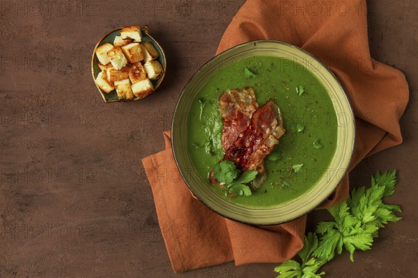 Green mashed soup, with bacon and croutons, homemade, no people