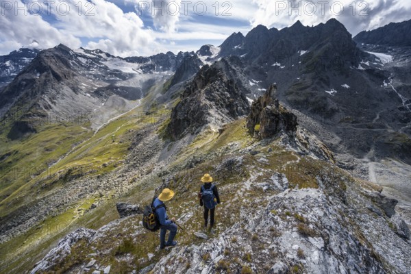 Two climbers on a mountain ridge, ascent to the summit of Mont de la Blana, view of rocky mountain landscape, Hérménence, Valais Alps, Valais, Switzerland, Europe