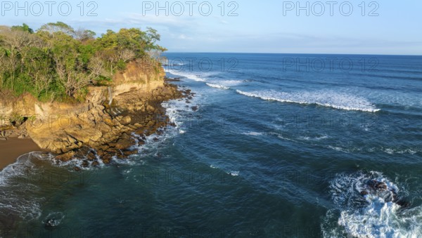 Aerial view, rainforest, sandy beach and coast with waves, Playa Cocalito, Puntarenas, Costa Rica, Central America