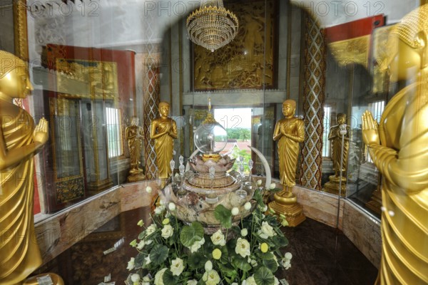 Reliquary with relics under glass in dome of tower in top of Chedi highest building in temple complex Buddhist monastery Wat Chalong Wat Chaitararam, Phuket, Thailand, Asia