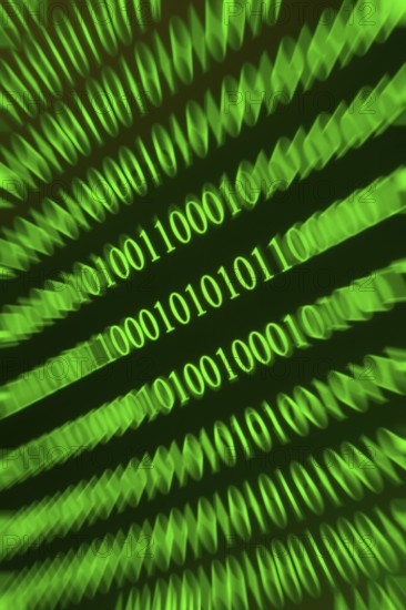 Swirling green binary numbers with blurring, techno-like representation