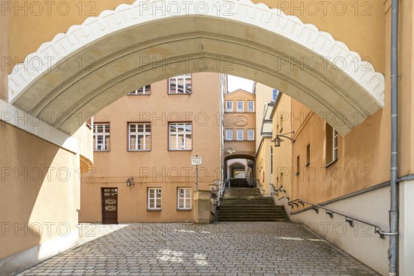 Archway at the New Town Hall with stairs at the portico, the passageway to the AltmarktLichtenstein, Saxony, Germany, Europe