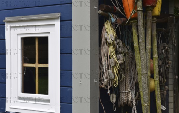 Fisherman's house, fishing hut with nets and traps for fishing on Heligoland, Schleswig-Holstein, Germany, Europe