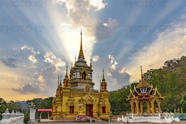 Sunbeams over the Buddhist temple Wat Namtok Mae Klang in Ban Luang, Chom Thong, Chiang Mai, Thailand, Asia