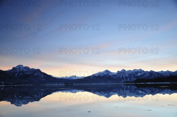 Sunset at the Forggensee near Füssen in the Allgäu, on the left the Säuling (2047 m), Bavaria, Germany, Europe